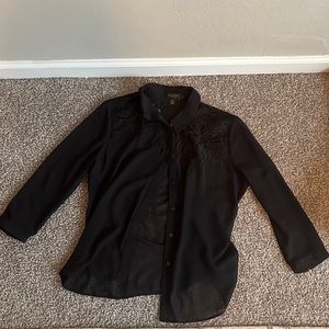 Black chiffon blouse with collar bone flower detail